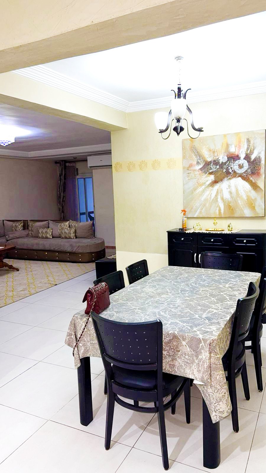 Dining and living space inside HiTanger Downtown Gem.